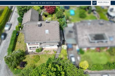 Charmantes Zweifamilienhaus mit großem Garten – Vielseitig nutzbar und sofort bezugsbereit