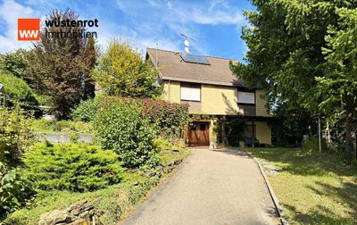 Zweifamilienhaus mit Doppelgarage, großem Garten und idyllischer Aussicht in Abtsgmünd