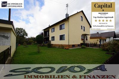 Schönes Zweifamilienhaus mit zwei Garagen aus einem großzügigen Grundstück - Ein Objekt von Ihrem Immobilienpartner SOWA Immobilien und Finanzen