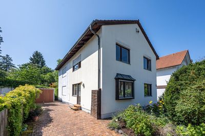 AIGNER - Ruhig wohnen, sonnig leben: Charmante Doppelhaushälfte mit Potenzial und Süd-West-Garten