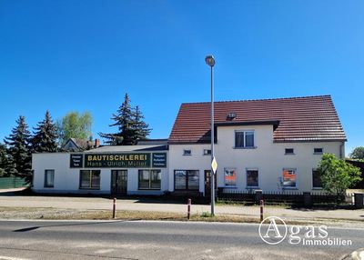 Wohnhaus mit Wintergarten und ca. 350 m² Werkstatt und Doppelgarage in verkehrsgünstiger Lage