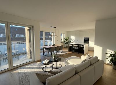 MANNELLA *Qualitatives Wohnen in Rheinnähe* Neubau Etagenwohnung mit Dachgarten.