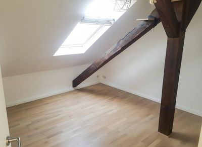 Schöne 3,5- Zimmer Dachgeschoss Wohnung mit Gartenmitbenutzung