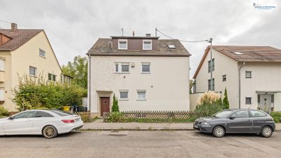 Investition & Lebensqualität: 3-Familien-Haus mit großem Garten