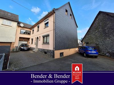 Solides Doppelhaus mit Ladenlokal in zentraler Lage in Rennerod!