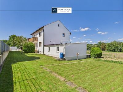 Einfamilienhaus mit herrlich großem Gartengrundstück und zwei großen Garagen