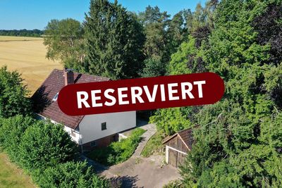 Einfamilienhaus mit Einliegerwohnung auf großem Grundstück in idyllischer und uneinsehbarer Ecklage