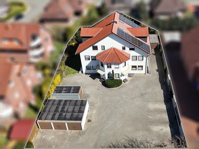 Attraktives Mehrfamilienhaus mit 8 Wohneinheiten - Kapitalanlage mit Potenzial in Holdorf!