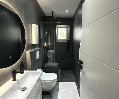 Attraktive Erdgeschosswohnung – modernisiert, Küche, Gemeinschaftsgarten