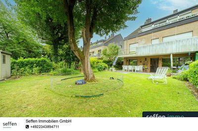 Vermietete 3-Zimmer-Erdgeschosswohnung mit Garten und Tiefgarage