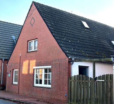 Einfamilienhaus mit Einliegerwohnung in Oldenswort zu verkaufen