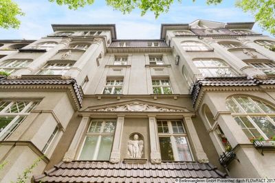 Bezugsfreie Dachgeschosswohnung mit Aufdachterrasse, Wintergarten und Kamin