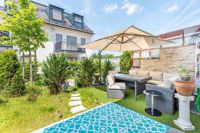 3-Zimmer-Gartenwohnung inklusive vielseitig nutzbarem Hobbyraum und Westterrasse!