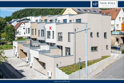 Modernes Reihenmittelhaus mit Terrasse und Balkon – stilvoll leben auf drei Ebenen