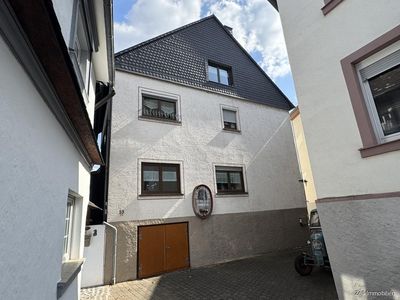 Interessantes, großzügiges Ein- bis Zweifamilienhaus mit Rheinblick und großem Weinkeller