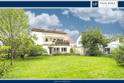 Ansprechendes Zweifamilienhaus mit Wintergarten und viel Platz im Grünen