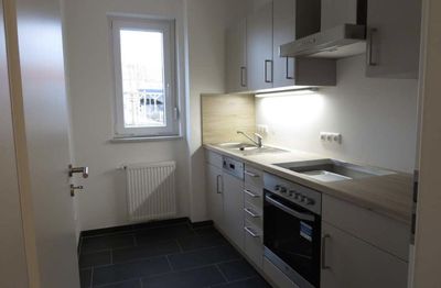 2-Zimmer-Erdgeschosswohnung mit Terrasse und EBK in Würzburg-Lengfeld