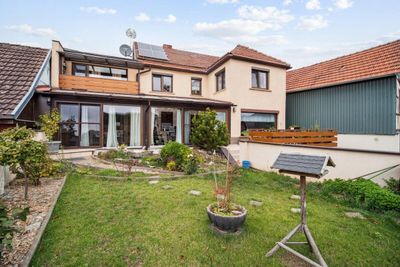 Provisionsfrei – Familienfreundliches Haus in ruhiger Lage mit Einliegerwohnung und grünem Garten