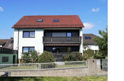 2-Familienhaus + DG-Wohnung mit großem Garten in ruhiger Lage!