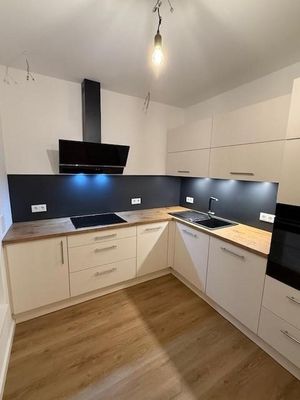 Neubau Terrassen-Maisonette mit Garten und Einbauküche