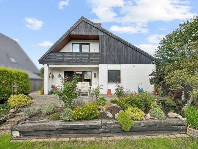 Zuhause ankommen: Familienfreundliches Haus mit schönem Garten in Hamburg-Poppenbüttel