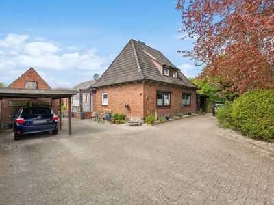 Zweifamilienhaus mit Charme und Potenzial auf großzügigem Grundstück in Alt Duvenstedt