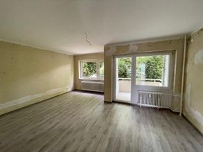 Wohnzimmer mit Balkon