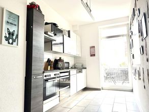 Wohnküche + Zugang zum Balkon