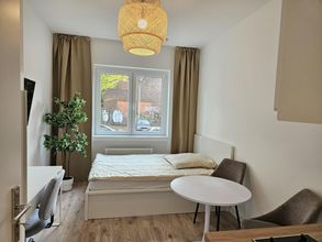 Bett mit Staufunktion