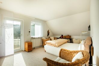 Schlafzimmer mit Zugang zum Balkon