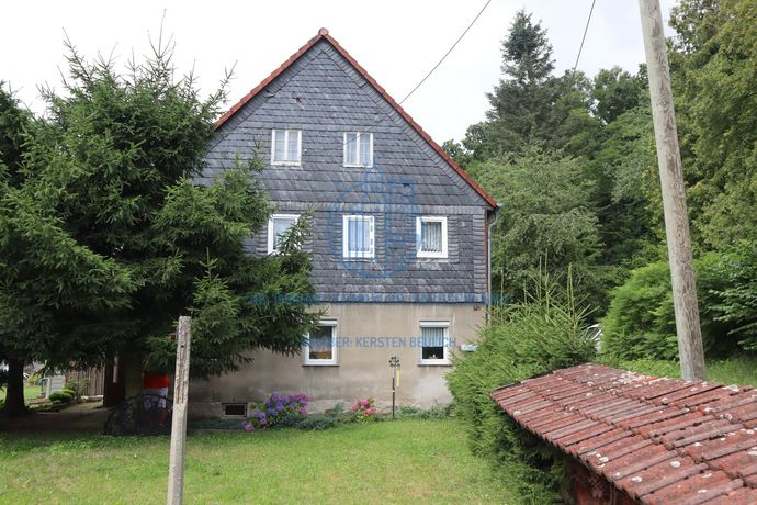 Giebelansicht mit anteiliger Schieferfassade