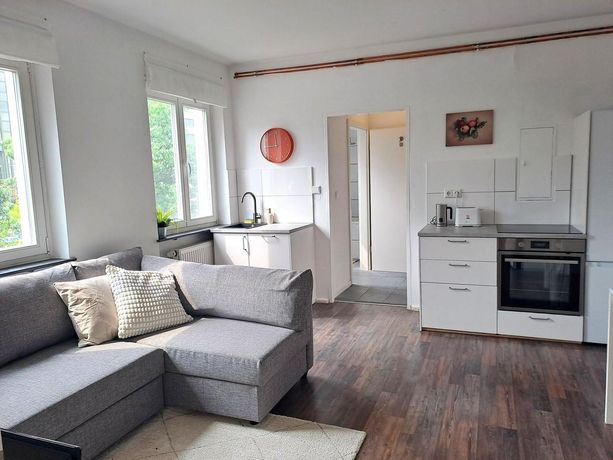 Wohnzimmer mit Küche