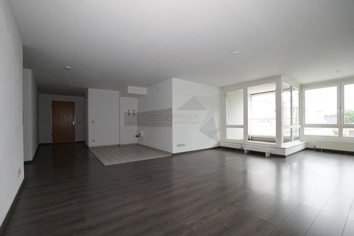 Wohnzimmer mit offener Küche